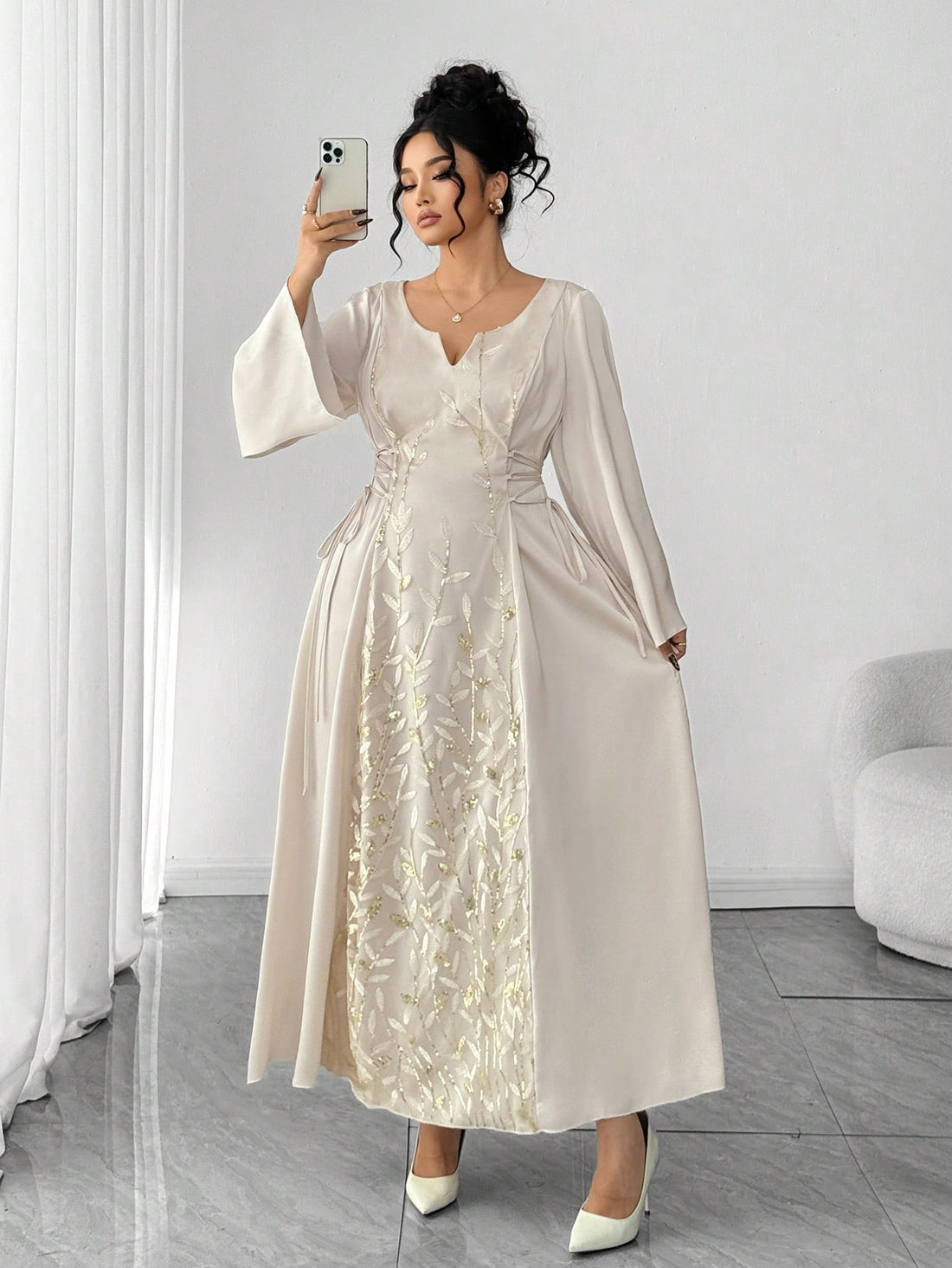 Shine bright like the sequin-studded star you are! This plus-size dress combines elegance with a touch of glamour, featuring intricate sequin embroidery that catches the light beautifully. The flattering V-neckline and flowy flare sleeves create a silhouette that's both sophisticated and fun. Perfect for evening events, parties, or whenever you want to feel absolutely fabulous. Slip into confidence and let your sparkle do the talking!