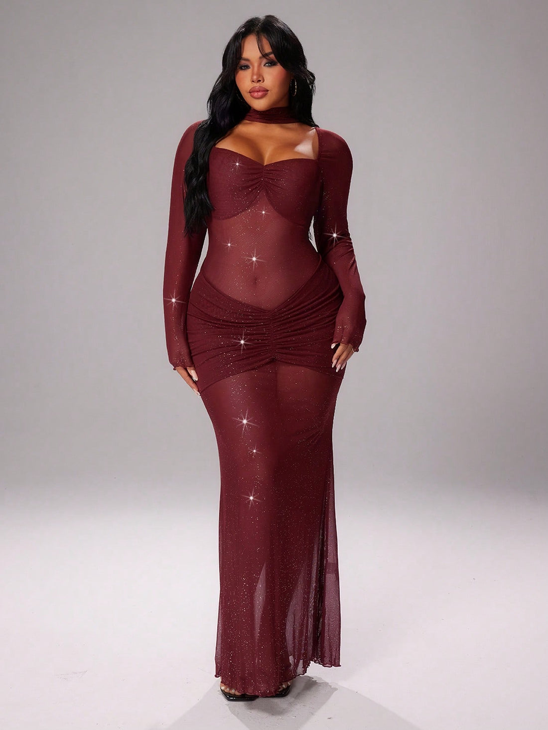 Shine bright this season in our stunning plus-size sequin dress! Crafted from luxuriously soft mesh, this black beauty features a flattering bodycon silhouette that celebrates your curves. The shimmering sequin detailing catches every light, making you the star of any holiday party. Long sleeves keep you cozy through autumn and winter while maintaining that undeniably sexy, elegant vibe. Perfect for Christmas celebrations, festive gatherings, or whenever you want to feel absolutely fabulous. This midi-lengt