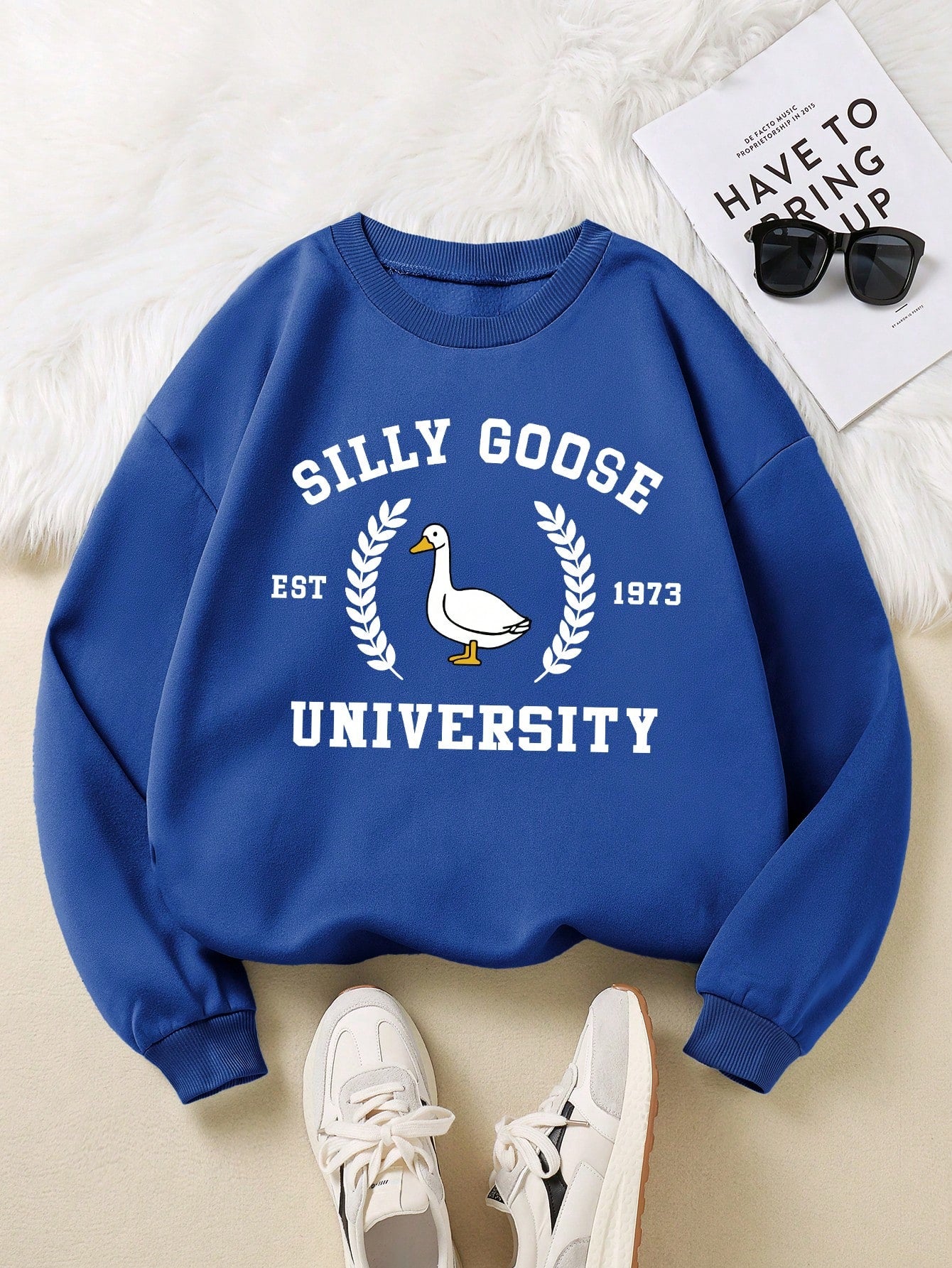 Unleash your inner silly goose with our Plus Size Silly Goose University Fleece Sweatshirt! Stay warm and cozy this autumn and winter with its fleece material, while adding a touch of casual style to your wardrobe. Perfect for any occasion, this sweatshirt will make you feel confident and comfortable.