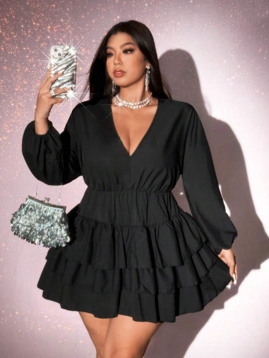 Step out in style with this playful plus size solid V-neck dress. Featuring long sleeves and a charming pleated short skirt, it offers effortless comfort and a flirty silhouette perfect for casual days. Embrace easygoing elegance that moves with you!