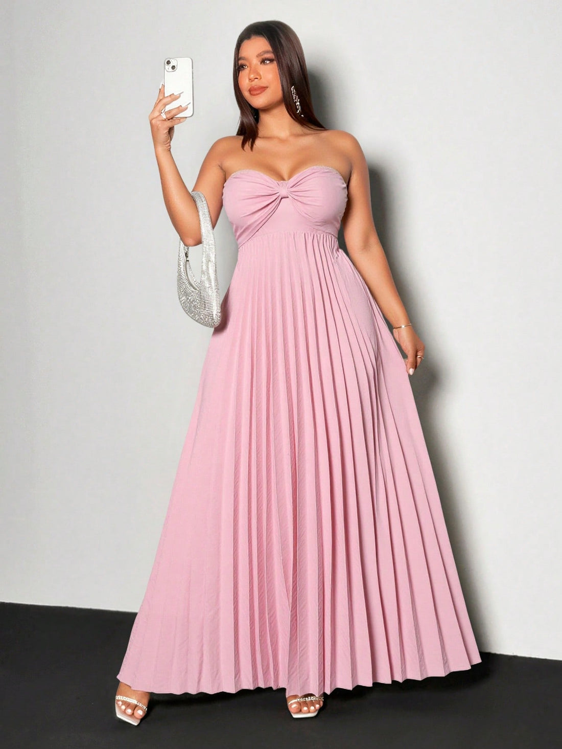 Turn heads effortlessly in this Plus Size Strapless Pleated Dress, designed to bring out your romantic side with a playful twist. Its flowing pleats add movement and charm, while the strapless cut highlights your shoulders for a flirty, elegant look. Perfect for any occasion where you want to feel confident and fabulous!