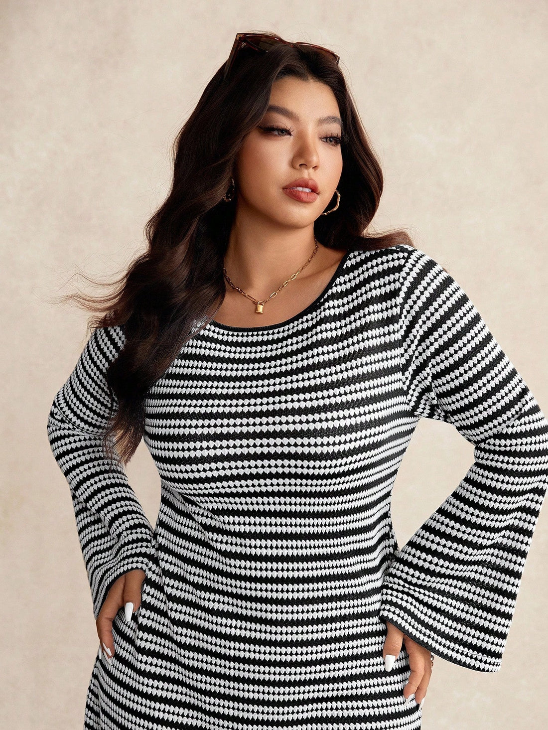 Turn heads this fall in our Plus Size Striped Casual Dress, designed with a playful flare! Featuring a comfy round neck and whimsical flare sleeves, it blends style and ease perfectly. The flattering stripes add a fun twist, making it a must-have for your cozy autumn wardrobe. Whether out for brunch or a casual day about town, this dress keeps you looking fabulous and feeling free!