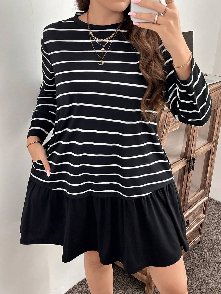 Turn heads this autumn with our Plus Size Striped Ruffle Hem Dress! Featuring a fun round neck and playful ruffle hem, this casual dress adds bounce and charm to your everyday look. The classic stripes mix comfort with style, perfect for cozy days out or relaxed gatherings. Embrace the season with a dress made to flatter and delight!