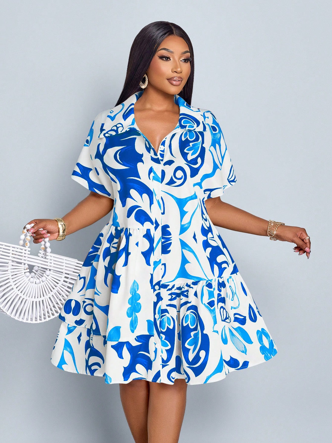Embrace sunny days in this playful plus size summer dress designed to flatter your curves with a waist-cinching fit. The button-front detail adds a touch of charm, making it easy to slip on for effortless casual style. Perfect for everything from brunch dates to beach strolls, this dress combines comfort and fun in one breezy package.