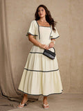 Refresh your warm-weather wardrobe with this chic plus size summer dress, designed with playful patchwork details and a feminine ruffle hem for an effortlessly stylish look. The relaxed silhouette offers comfortable movement while creating an easy, flattering fit for a variety of body shapes. Lightweight and easy to wear, this dress is perfect for casual weekends, brunch dates, beach vacations, shopping trips, garden gatherings, and laid-back summer outings. 