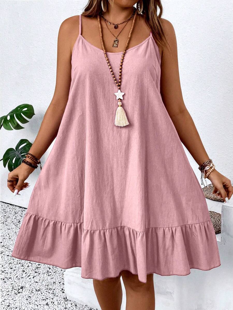 Embrace effortless summer style with this plus-size sleeveless dress designed for comfort and elegance. Delicate spaghetti straps provide a flattering silhouette while the ruffle pleats add playful movement and dimension to your look. The lightweight fabric keeps you cool during warm days, making it perfect for casual outings, beach trips, or relaxed gatherings.