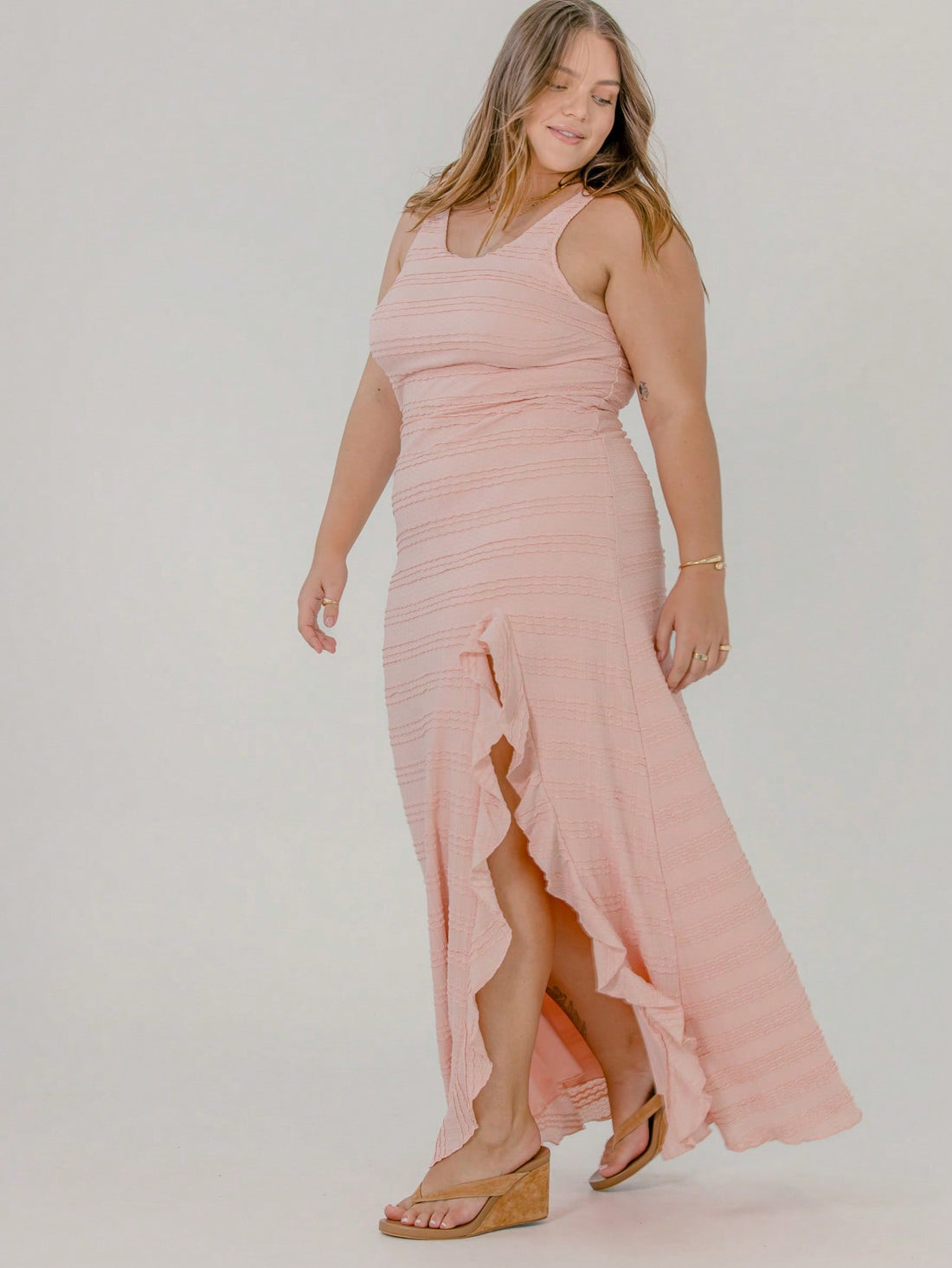 Slip into effortless style with this Plus Size Textured Maxi Dress featuring a flirty split that keeps you cool and confident. Perfect for casual vacations, its soft texture and flowy design offer all-day comfort while adding a touch of playful elegance to your look. Whether strolling the beach or exploring new spots, this dress is your go-to for easy, breezy charm.