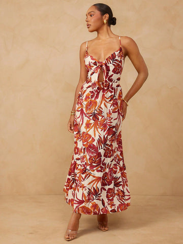 Embrace your sunny side in this Plus Size Tropical Plant Print Tie Front Cami Dress! With vibrant tropical patterns and a flirty tie-front detail, it's your go-to for effortless resort vibes. Lightweight and breezy, it keeps you cool while turning heads on sunny walks or beachside escapes. Perfectly playful and comfortably chic, this dress invites you to soak up the good times in style.