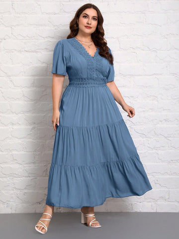 Embrace sunny days in style with this playful plus size V-neck dress featuring elegant lace patchwork and breezy short sleeves. Perfect for summer holidays, its flattering fit and charming details make it your go-to choice for effortless, cheerful vibes wherever you wander.