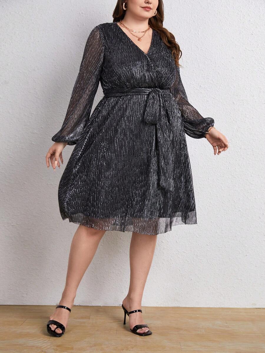 Elevate your wardrobe with this fabulous plus-size dress that's all about making you feel amazing! The flattering V-neckline draws the eye upward, while the charming lantern sleeves add a playful touch of personality. Cinch it at the waist with the included belt to define your silhouette and create instant polish. Perfect for everything from brunch dates to evening outings, this dress proves that style and comfort aren't mutually exclusive. Slip it on and own every room you walk into!