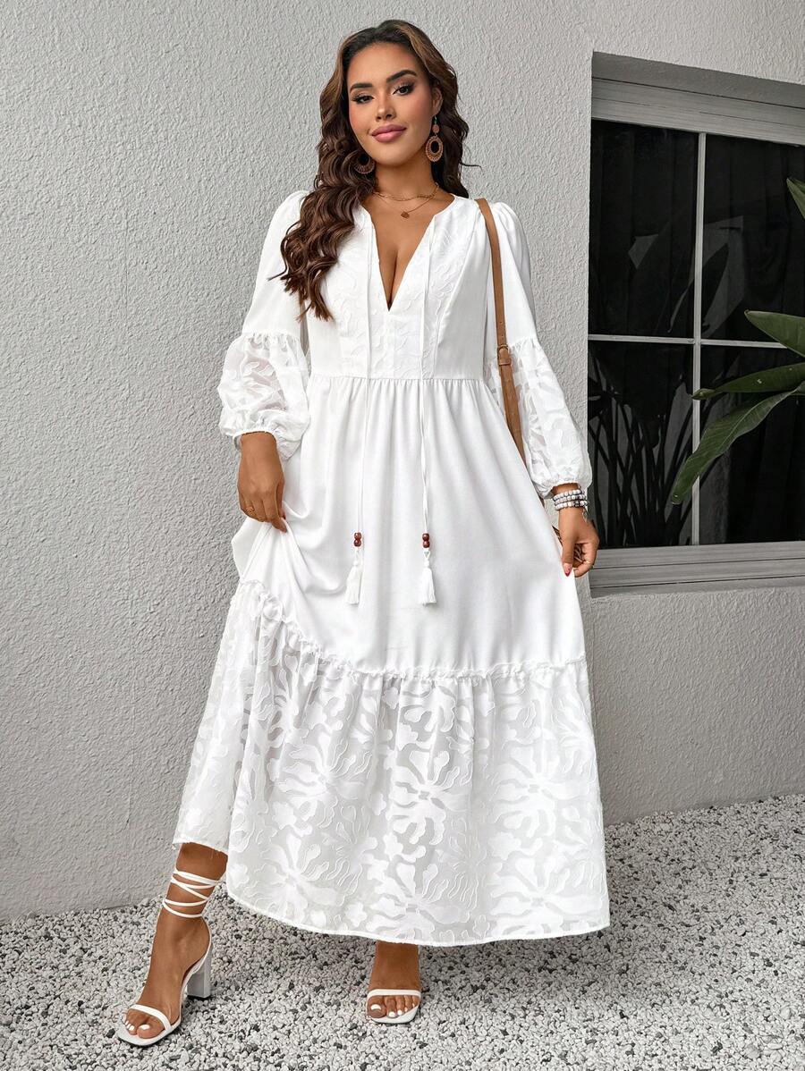 Embrace effortless style with this plus size white loose long dress, perfect for holiday escapes and beach days! Its boho vibe and breezy fit keep you cool and comfy, while the flowing silhouette adds a touch of carefree charm. Ideal for lounging by the shore or exploring summer markets, this sundress is your go-to for playful, laid-back looks on vacation.