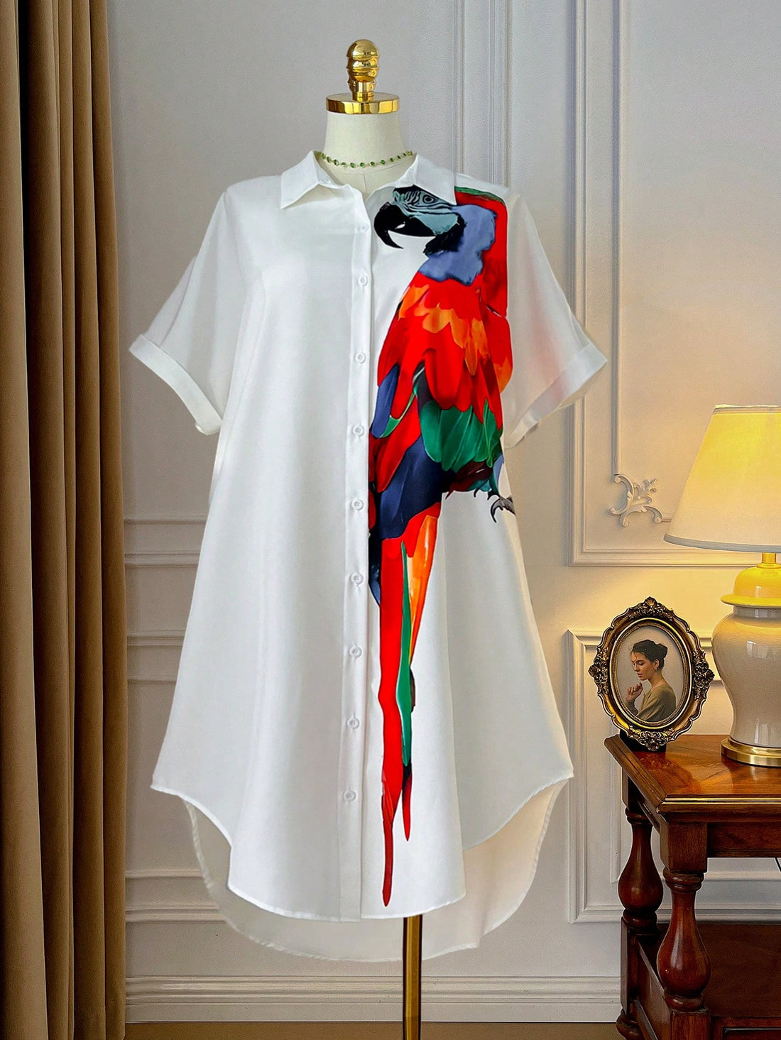 Embrace sunny days in this playful plus size shirt dress featuring a vibrant parrot print. The batwing sleeves offer breezy comfort, while the button-front design adds a casual, effortless vibe perfect for holiday adventures. Lightweight and fun, it’s your go-to summer essential for easy style and all-day comfort.