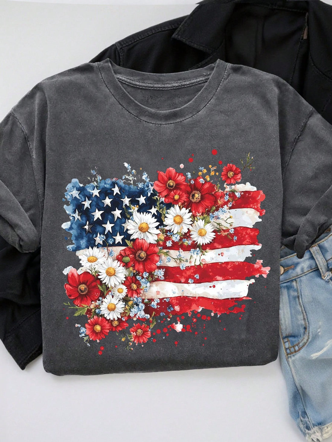 Celebrate summer in style with this playful plus size women's T-shirt featuring a vibrant American flag and floral print. Its short sleeves keep you cool while the bold design adds a fun, festive touch to any casual outfit. Perfect for sunny days and patriotic vibes!
