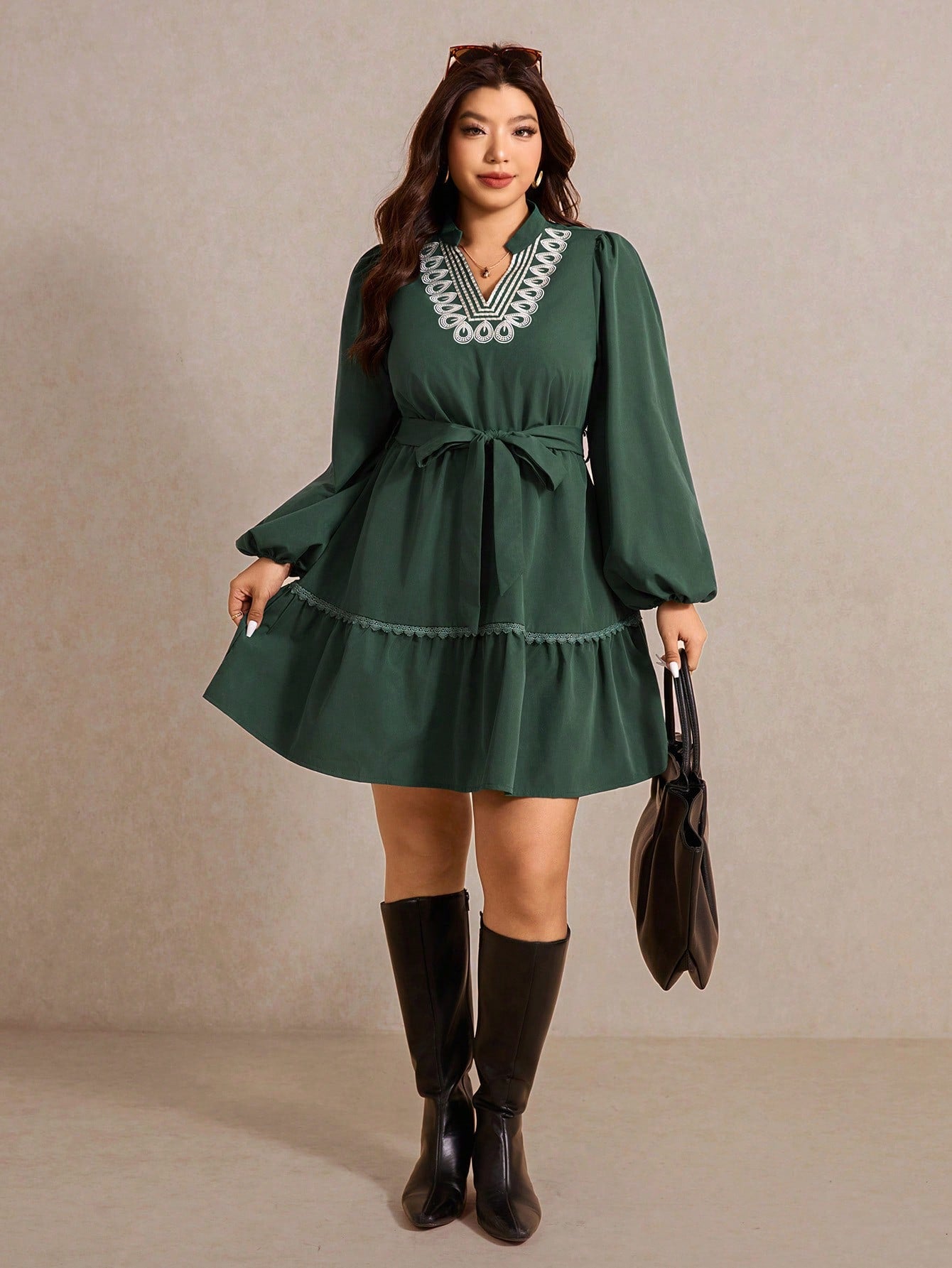 Effortlessly chic and oh-so-comfortable, this plus-size dress is your new go-to for looking put-together without trying too hard. The playful knotted waist detail cinches your silhouette while the relaxed long sleeves keep things casual and cool. Perfect for running errands, coffee dates, or just feeling fabulous in your everyday life. Slip it on and let the dress do the work—because style should always feel this easy and fun!