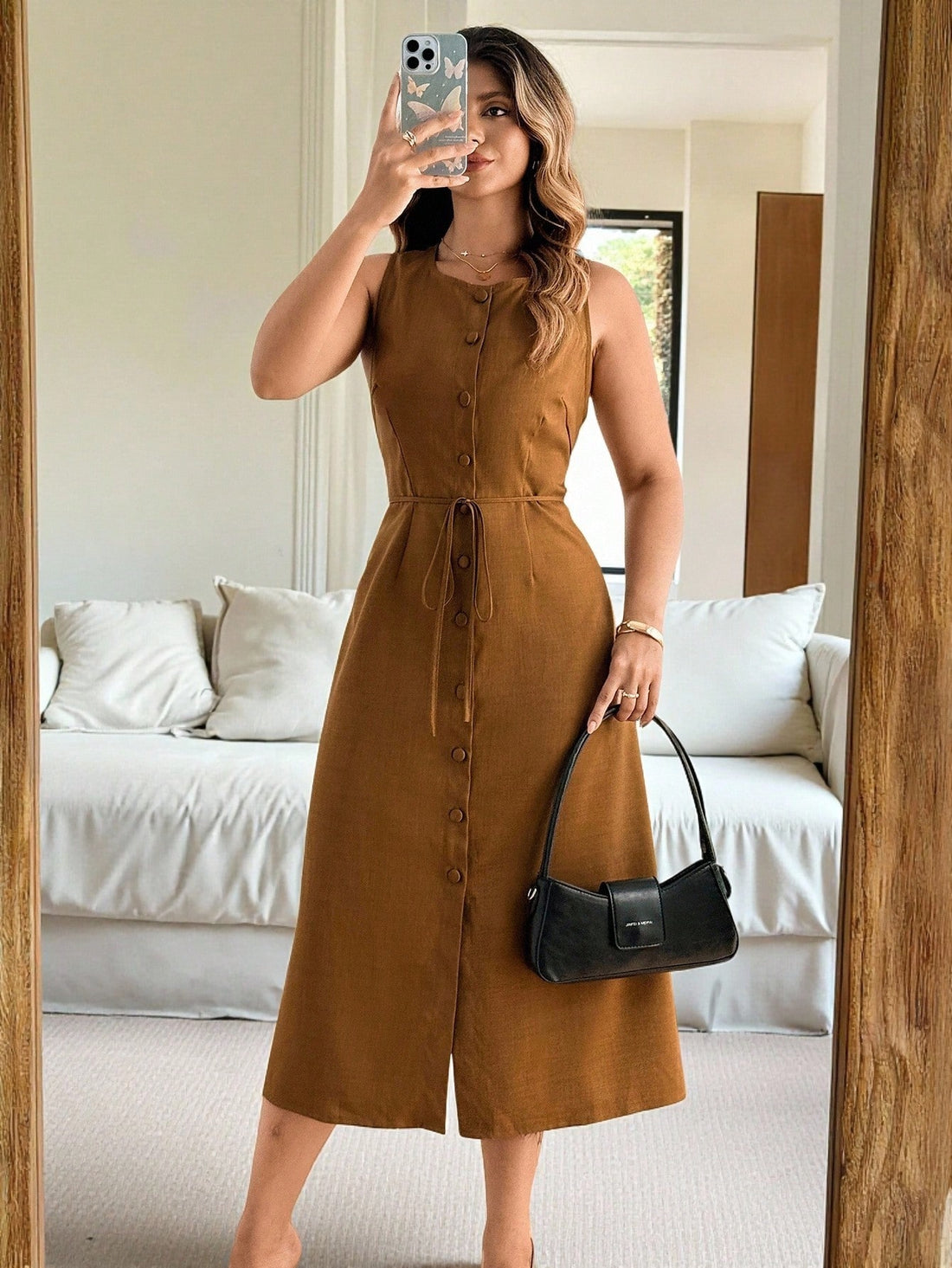 Embrace effortless style with this plus size sleeveless dress featuring a playful round neck and a chic single-breasted design. Perfect for casual days, it offers a comfortable fit that lets you move with ease while keeping your look fresh and fun. Whether you're out with friends or enjoying a sunny stroll, this dress brings a touch of whimsy to your wardrobe.