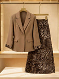 Make a statement this season with our Plus Size Elegant Blazer and Leopard Print Skirt Set! Pair a sophisticated tailored blazer with a bold leopard print skirt for an outfit that's equal parts polished and playful. Perfect for autumn and winter gatherings, this two-piece set lets you mix confidence with style. The structured blazer keeps things professional while the wild print adds personality—because fashion should be fun! Dress it up for special occasions or down for everyday flair. Comfort meets glamou