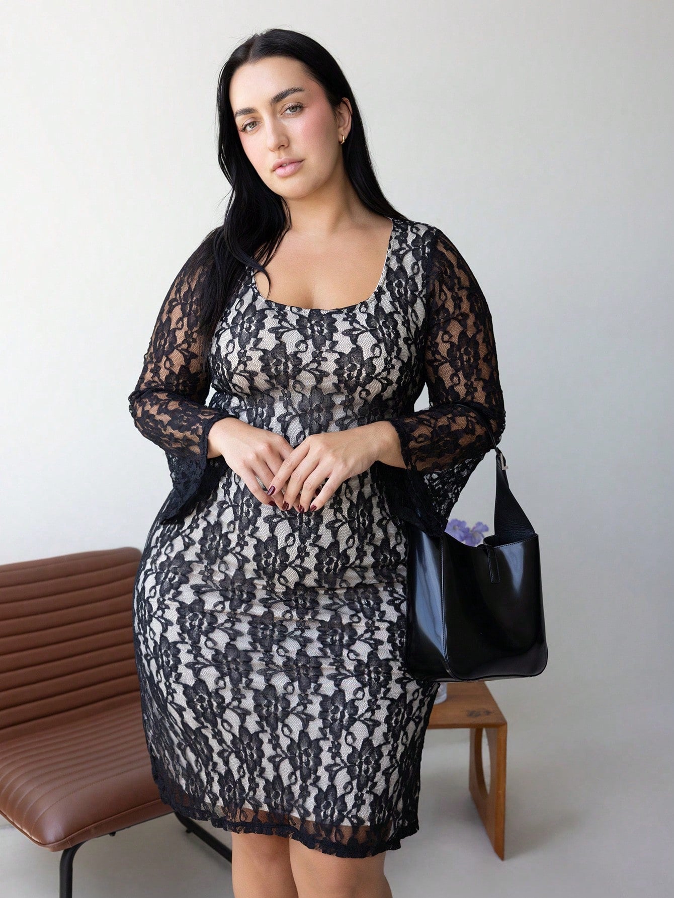 Elevate your seasonal wardrobe with this stunning plus-size lace dress that's equal parts elegant and fun! The fitted silhouette flatters your curves while delicate lace detailing adds timeless sophistication. Flare sleeves bring a playful twist that catches the eye and moves beautifully as you do. Perfect for autumn and winter gatherings, this dress transitions effortlessly from casual outings to special occasions. Comfortable, chic, and unapologetically fabulous—because looking good should feel amazing.