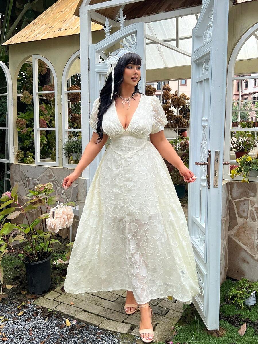 Stylish plus size floral V-neck dress with a chic cutout detail. Perfect for summer vacations, brunches, date nights, casual outings, and special occasions.