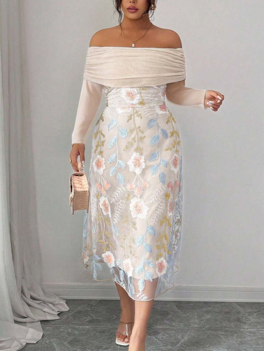 Embrace your curves in this stunning plus-size dress that's equal parts elegant and fun! The off-shoulder neckline shows just the right amount of skin, while delicate embroidered mesh panels add texture and visual interest. Patchwork details create a unique, artsy vibe, and the pleated skirt offers flattering movement and dimension. Long sleeves keep things sophisticated without sacrificing style. Perfect for date nights, special occasions, or whenever you want to feel fabulous and fashion-forward. This dre