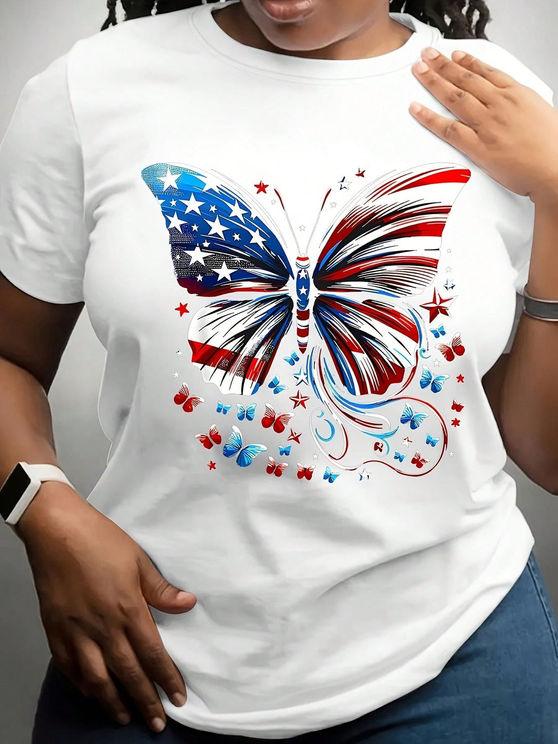 Celebrate Independence Day in style with this playful plus size women's T-shirt featuring a vibrant American flag butterfly adorned with stars. Designed for comfort and festive fun, it’s perfect for showing your patriotic spirit at barbecues, parades, or fireworks. Embrace your curves and your country with this eye-catching, spirited tee!