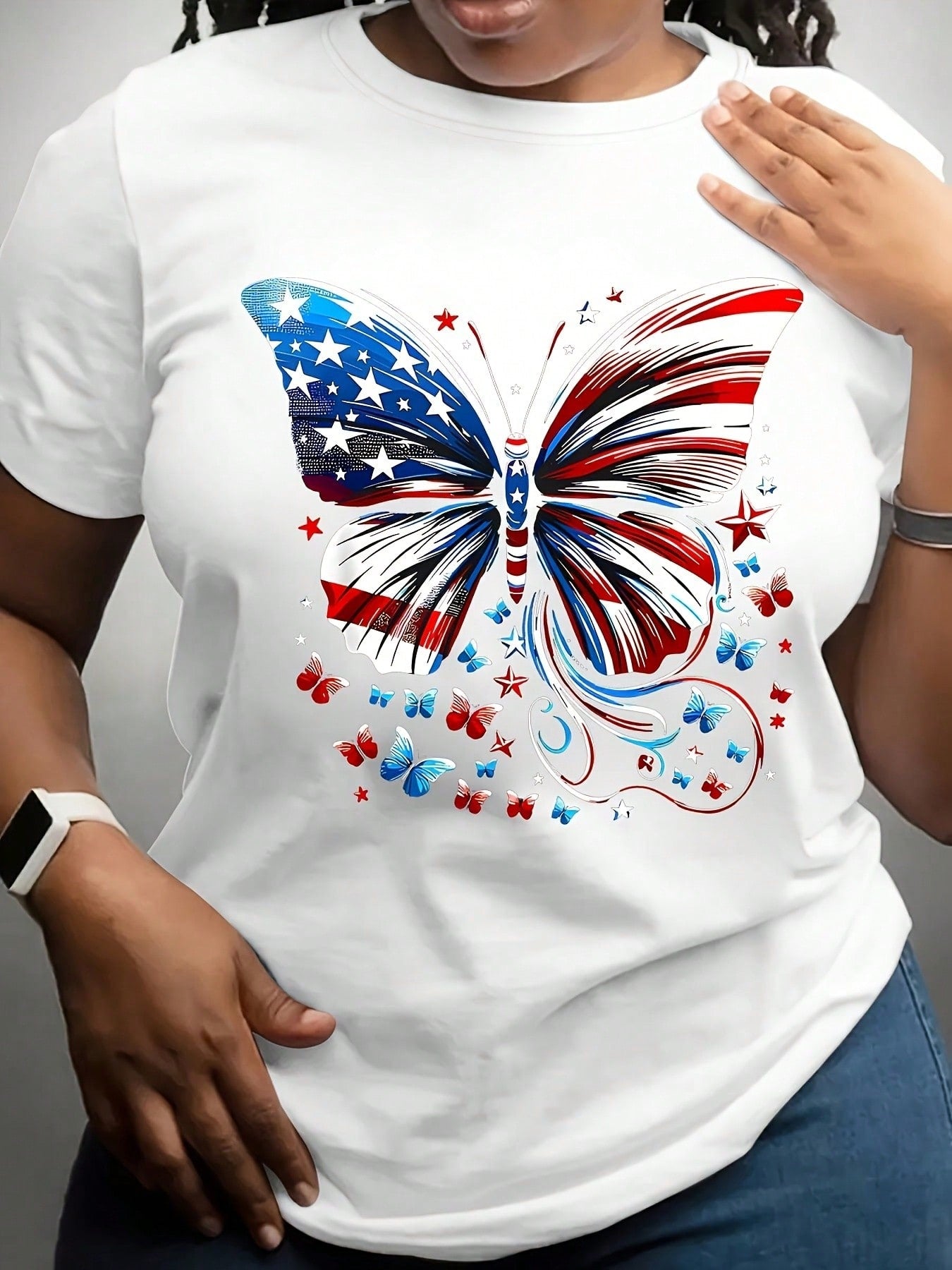 Celebrate Independence Day in style with this playful plus size women's T-shirt featuring a vibrant American flag butterfly adorned with stars. Designed for comfort and festive fun, it’s perfect for showing your patriotic spirit at barbecues, parades, or fireworks. Embrace your curves and your country with this eye-catching, spirited tee!