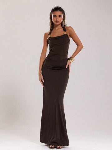 This sexy backless dress is perfect for summer! With its solid color and fish tail hem, you'll bring a touch of elegance wherever you go. The halter design adds a flirty touch, making it perfect for a night out or a day at the beach. Plus, its size accommodates all body types comfortably.