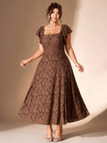 Front view of plus size coffee brown floral jacquard midi dress with square neck, flutter sleeves, high waist, and A-line skirt