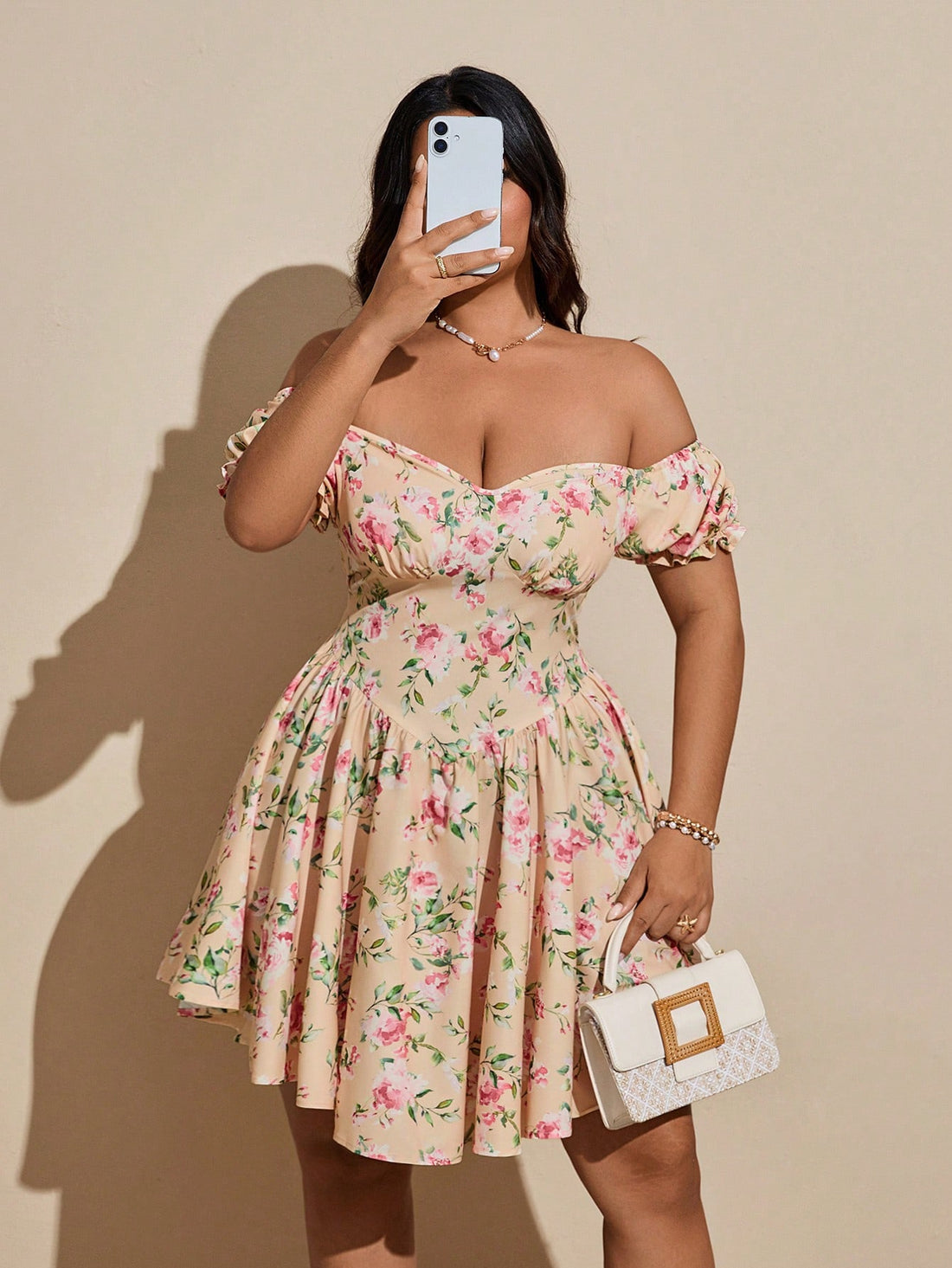 Embrace sunny days in style with this playful plus size off-shoulder dress, adorned with a vibrant floral print. Its breezy design keeps you cool and comfortable, while the off-shoulder cut adds a flirty touch perfect for summer outings. Whether you're strolling through a park or enjoying a casual brunch, this dress brings effortless charm to your warm-weather wardrobe.