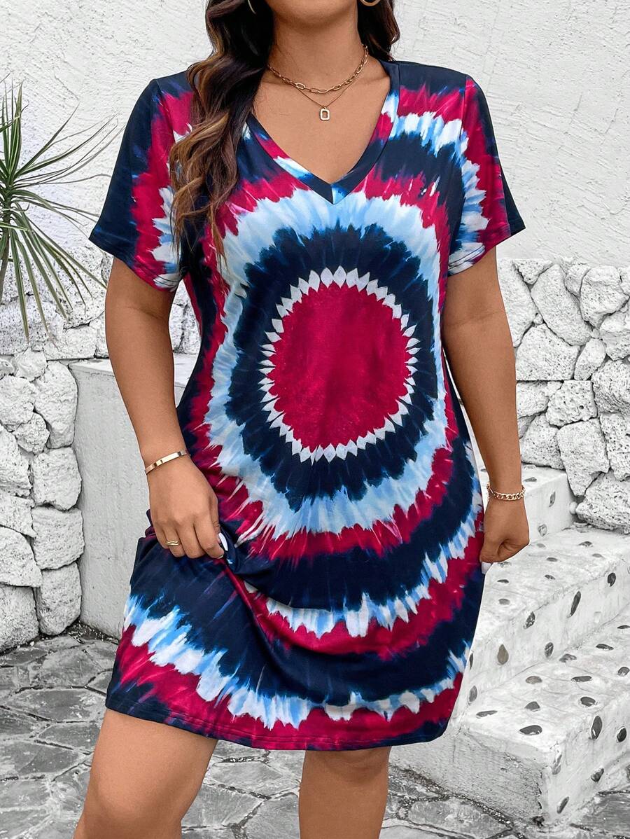 Embrace vibrant comfort with this plus size tie dye dress! Featuring a flattering V-neck and breezy short sleeves, it’s perfect for casual days when you want to shine effortlessly. Soft fabric and a playful pattern make it your go-to for easy, stylish vibes all day long.