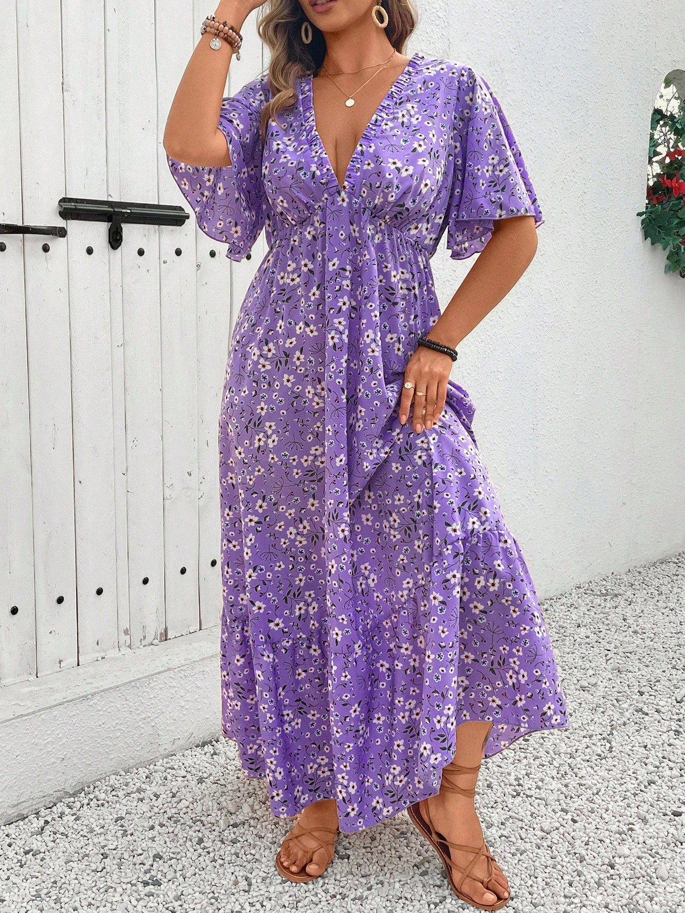 Twirl into the season with our Plus Size V-Neck Flowy Dress! Adorned with charming ditsy florals, this breezy number is your ticket to effortless style. Perfect for brunches, beach walks, or backyard barbecues—just add sandals and you're ready to bloom! This versatile spring/summer essential flatters every curve while keeping you cool when temperatures rise.