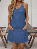 Achieve effortless style for every occasion with our Pocket Denim Cami Dress. Made from high-quality denim, this dress features a convenient pocket for a subtle yet functional touch. Perfect for any event, this versatile piece is a must-have in your wardrobe.
