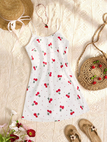 Spruce up your summer wardrobe with our Polka Dot Cherry Print Mini Dress! This playful and flirty dress features a cute cherry print, perfect for sunny days and picnics. You'll love the mini length that shows off your legs and the polka dot design adds a touch of whimsy. A must-have for any summer outing!