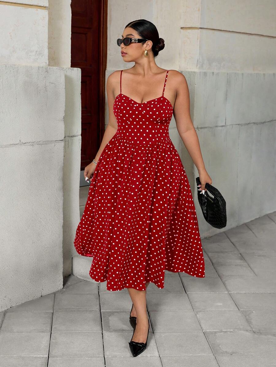 Step out in style with our Polka Dot Slip Dress—a playful twist on a summer classic. Its breezy silhouette and fun dotted pattern make it perfect for everything from brunch dates to sunset strolls. Lightweight and effortlessly chic, this dress keeps you cool while turning heads wherever you go. Add a touch of whimsy to your wardrobe with this versatile must-have!