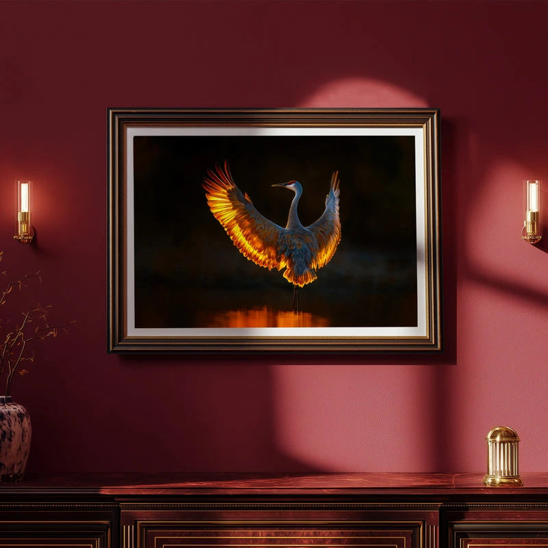 Witness the majesty of nature frozen in time! This stunning poster captures a magnificent sandhill crane mid-flight, wings fully extended against a breathtaking golden sunset. The warm, glowing light bathes the elegant bird in amber and rose tones, creating a mesmerizing display of natural beauty. Perfect for bird lovers, nature enthusiasts, and anyone seeking to bring a touch of wildlife wonder into their space. Transform your walls into a window to the wild with this captivating artwork that celebrates on