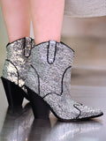 Elevate your style with Prida Mid Block Western Sequin Ankle Booties. Featuring a mid block heel and sparkling sequin design, these booties add a touch of glamour to any outfit. Perfect for dressing up or down, they are a versatile addition to your wardrobe.
