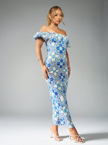 Experience elegance and style with our Printed Midaxi Dress! The unique design combines a flattering midaxi length and ruched puffball sleeves for a stunning look. Perfect for any occasion, this dress will have you feeling confident and chic. Say goodbye to boring outfits and hello to fashion-forward style!