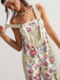 Close front view of cream floral woven suspender jumpsuit with bib pocket