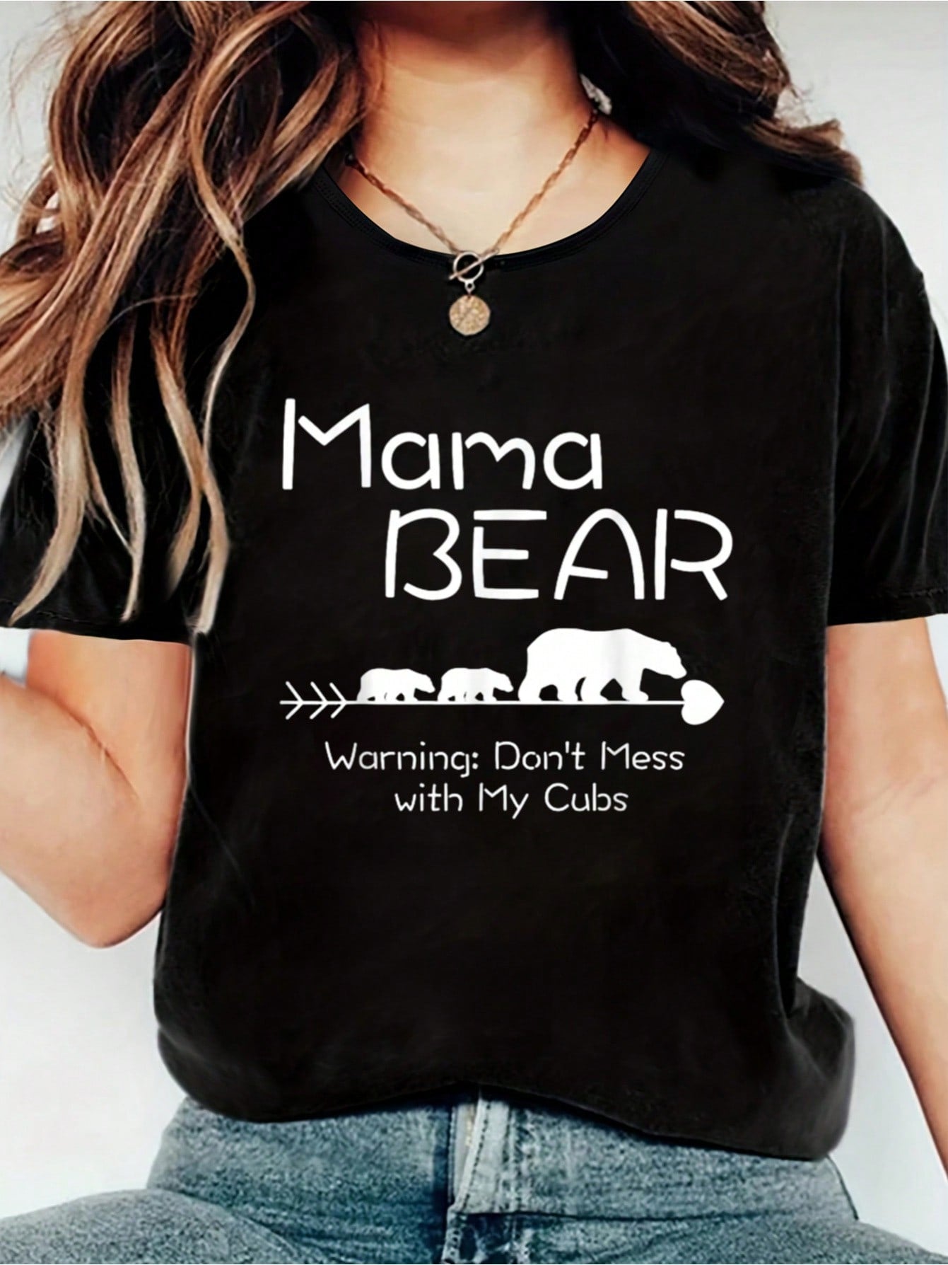 Show off your fierce side with our Protective Mama Bear Graphic Tee! With the bold print 'Don't Mess With My Cubs', this shirt is perfect for any Mama Bear who takes protecting her cubs seriously. Made with soft and durable fabric, you'll look stylish while keeping your little ones safe. No one messes with a Mama Bear!