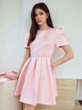 Step out in style with this playful Puff Sleeve Dress featuring a charming bow decor. Its voluminous sleeves add a flirty touch, while the bow detail brings a sweet, feminine flair. Perfect for any occasion, this dress effortlessly combines elegance with fun, making you the center of attention wherever you go.