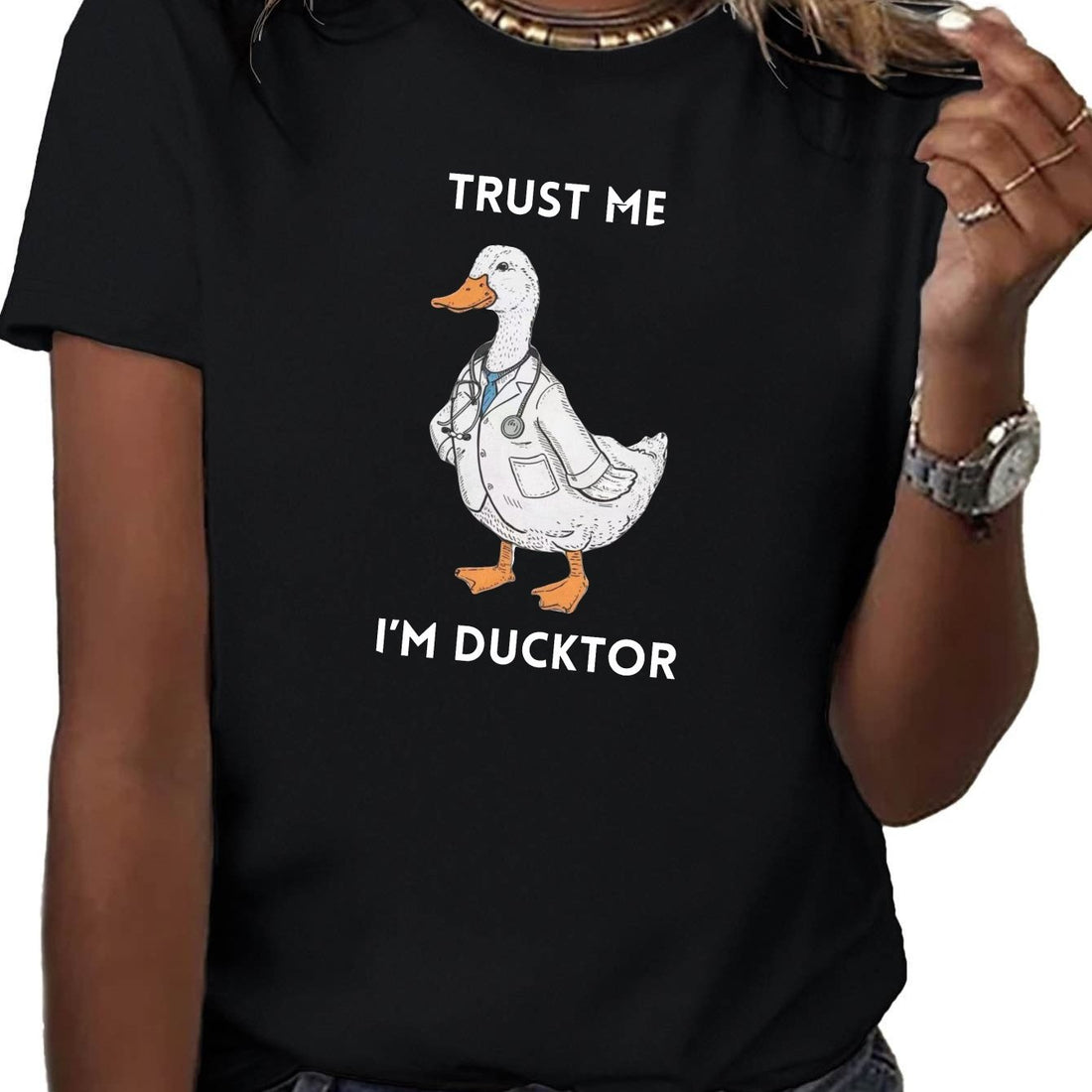This Quirky Duck Doctor Cotton Tee is a must-have for any wardrobe! Made with breathable cotton and a comfortable fit, it's perfect for everyday wear. And with its fun design, it's sure to add a touch of whimsy to any outfit. Get yours today and show off your quirky sense of style!