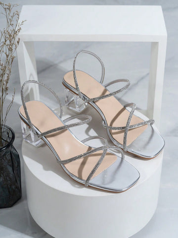 Elevate your style to new heights with these radiant rhinestone high-heeled sandals! The sparkling rhinestones add a touch of glamour to any outfit, making you stand out from the crowd. Get ready to sparkle and shine with these beauties!(Sandal to sparkle!)