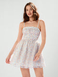 Slip into summer style with our Radiant Summer Elegance dress. Featuring ditsy floral patterns, delicate lace, and spaghetti straps, this dress exudes effortless elegance. Perfect for any sunny occasion, it's the epitome of chic and playful fashion.