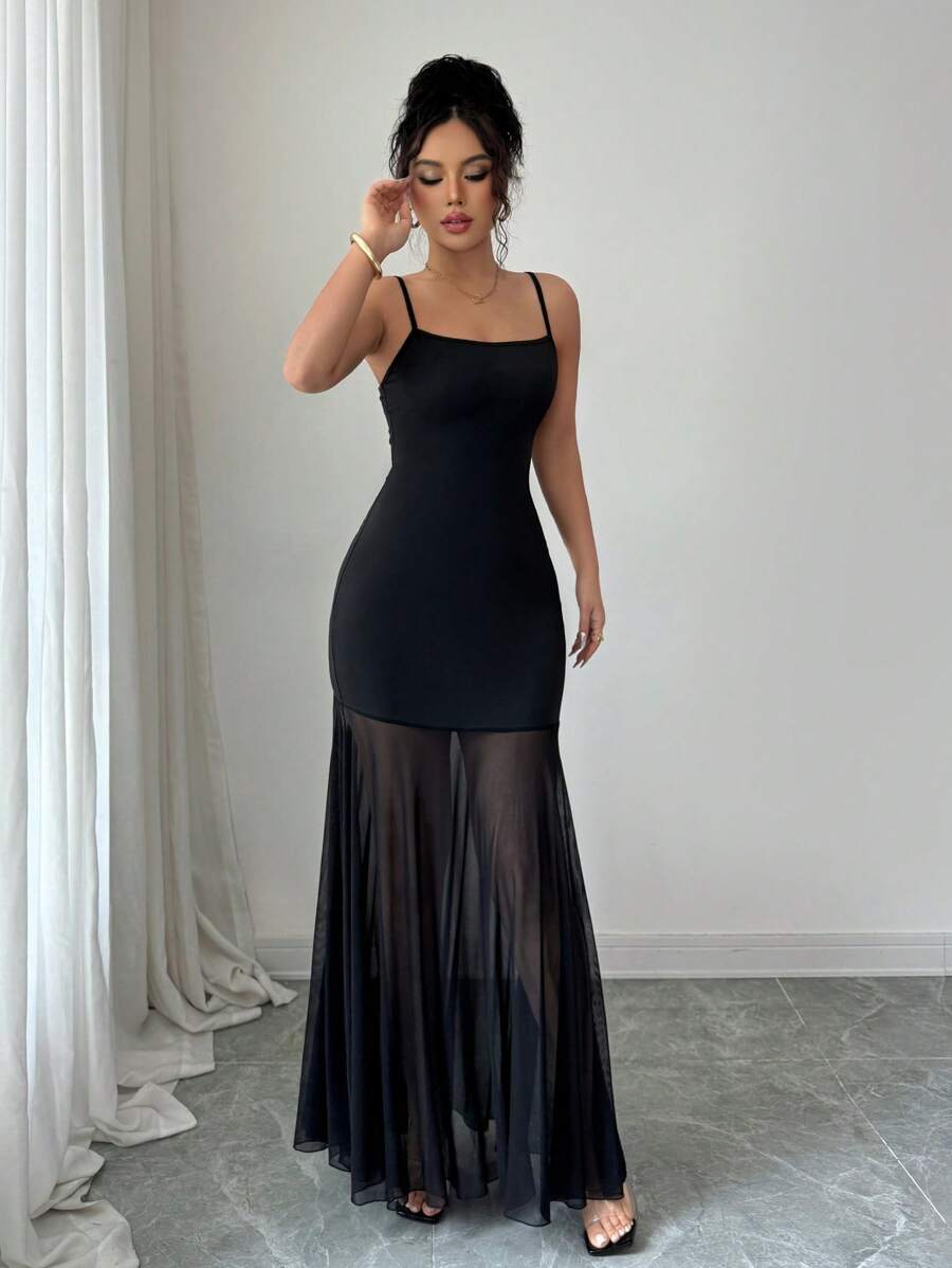 Step into the spotlight with the Rafferiza Bodycon Contrast Mesh Maxi Dress. This sleeveless slip dress combines bold mesh panels with a figure-hugging silhouette for a playful, summer-ready look that turns heads. Perfect for sunny days or warm evenings, its maxi length flows effortlessly while the contrast details add a touch of daring style. Embrace your confidence and make every outing a chic adventure.