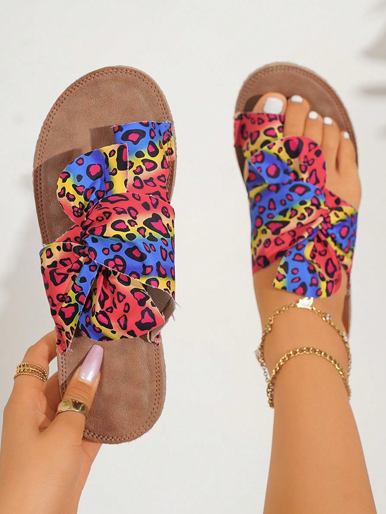 Experience comfort and style with Rainbow Bowknot Massage Bottom Beach Sandals. The unique bowknot design not only adds a touch of fashion to your outfit, but also provides a comfortable massage to your feet. Say goodbye to discomfort and hello to relaxation with these stylish sandals.