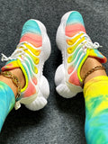 Experience fashion and functionality combined with Rainbow Runners. These casual sports shoes for women feature vibrant and bold colors that will make a statement as you conquer the day. Designed for comfort and style, these shoes are a must-have for any active and stylish woman.