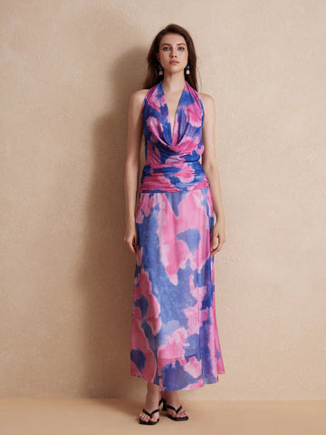 Get ready to turn heads with our Random Tie-Dye Backless Halter Neck Dress! With its French holiday style, this dress is perfect for achieving a chic and effortless look. The backless design adds a touch of playfulness, making it a must-have for any fashion-forward wardrobe. Perfect for any occasion, this dress will keep you feeling cool and stylish all day long.