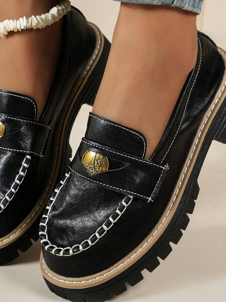 These Retro British Style Brown Penny Loafers combine classic design with modern comfort. Crafted with a durable thick sole, these slip-on flats offer reliable support for all-day wear, whether at the office or casual outings. Their timeless brown finish and penny loafer silhouette bring a sophisticated edge to your wardrobe, blending effortlessly with both formal and relaxed styles. Ideal for women seeking a blend of tradition, style, and practicality.