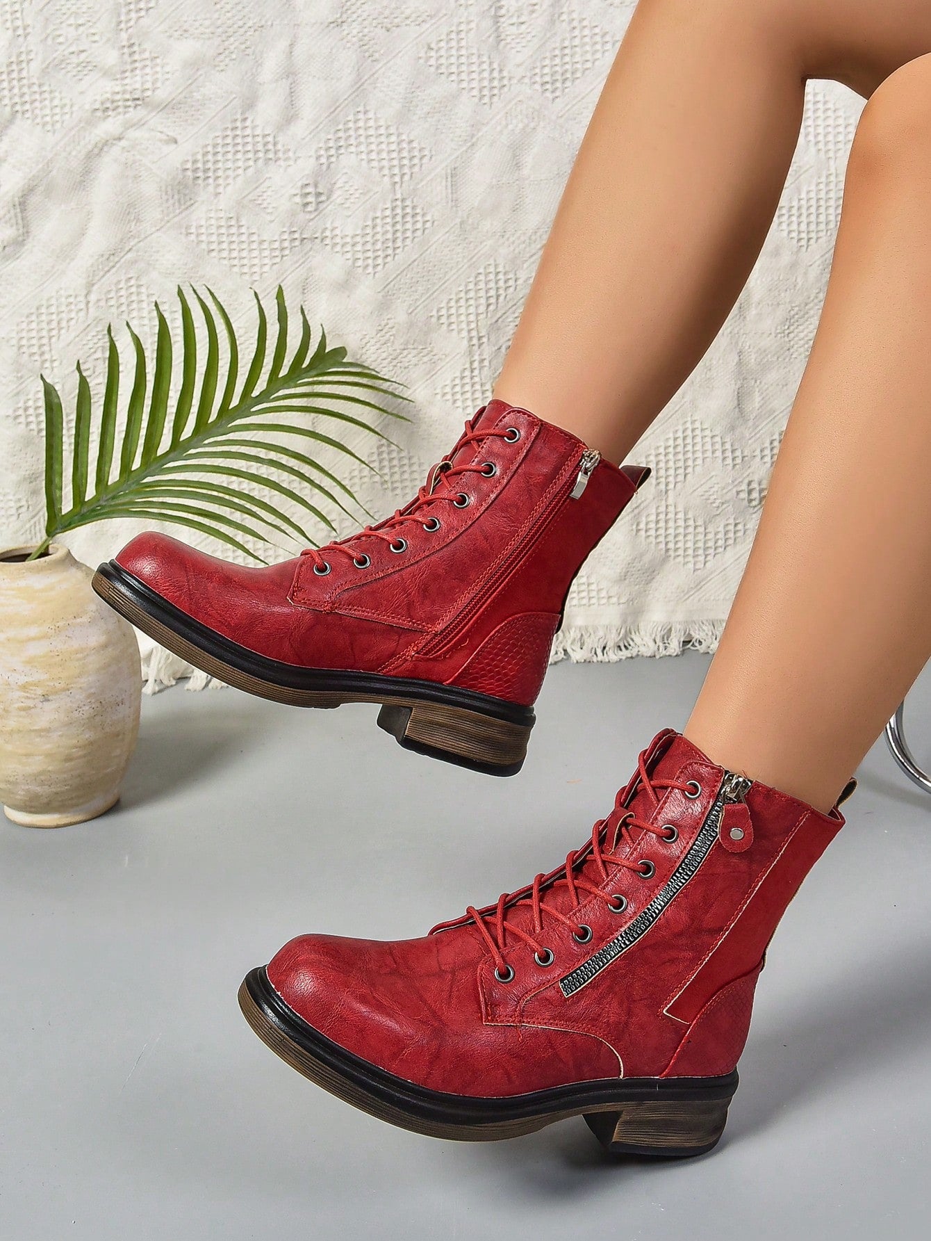 Experience elegance and comfort with our Retro British Style Lace-Up Ankle Boots. The lace-up design provides a secure fit while adding a touch of retro style. Walk confidently with every step, thanks to the comfortable and supportive construction. Elevate your wardrobe with these must-have boots.