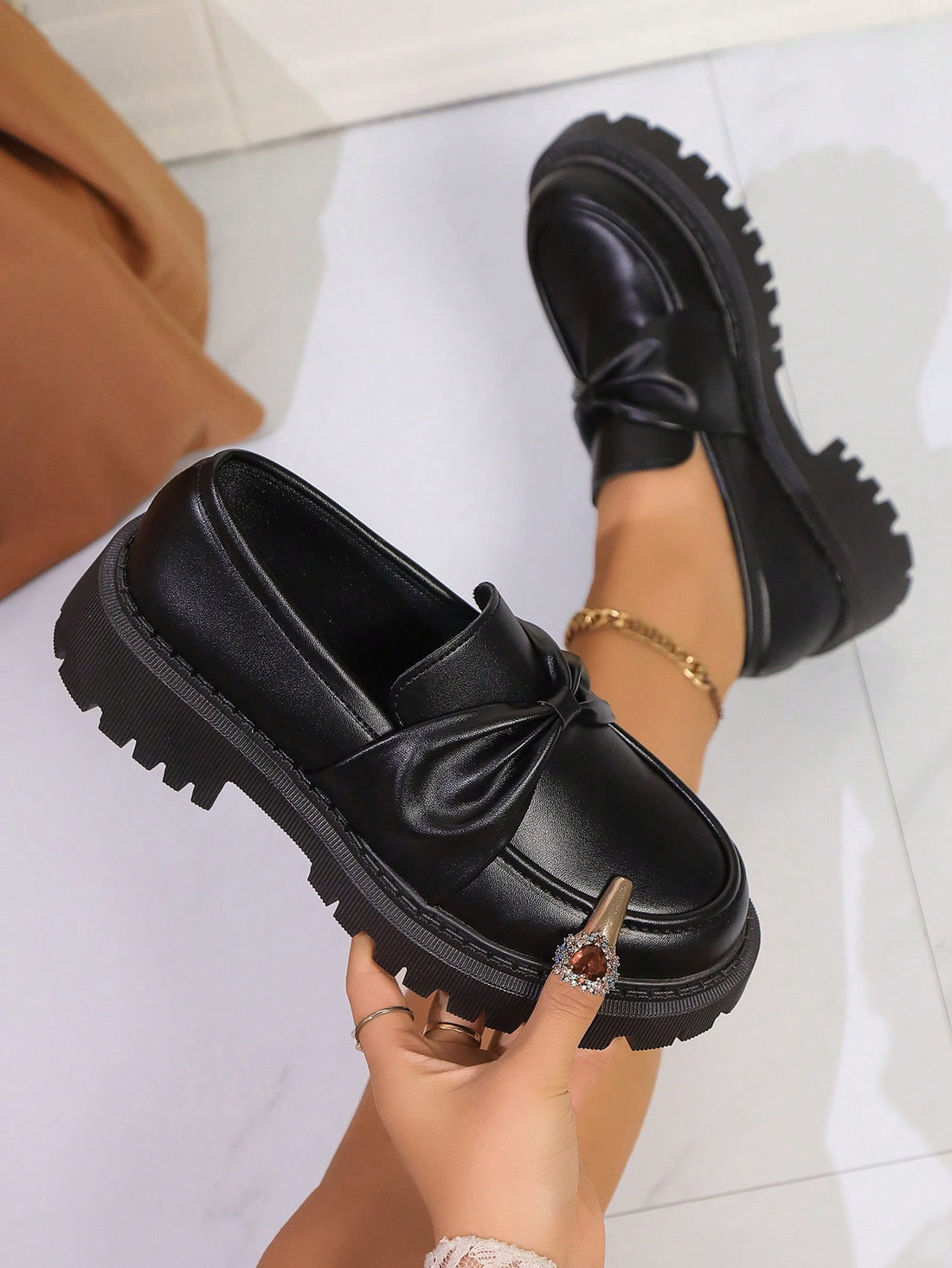 Experience the charm of the past with our Retro Charm loafers. With a chunky heel and bow tie slip-on design, these versatile vintage Mary Janes offer comfort and style. Add a touch of whimsy to any outfit and show off your playful side.