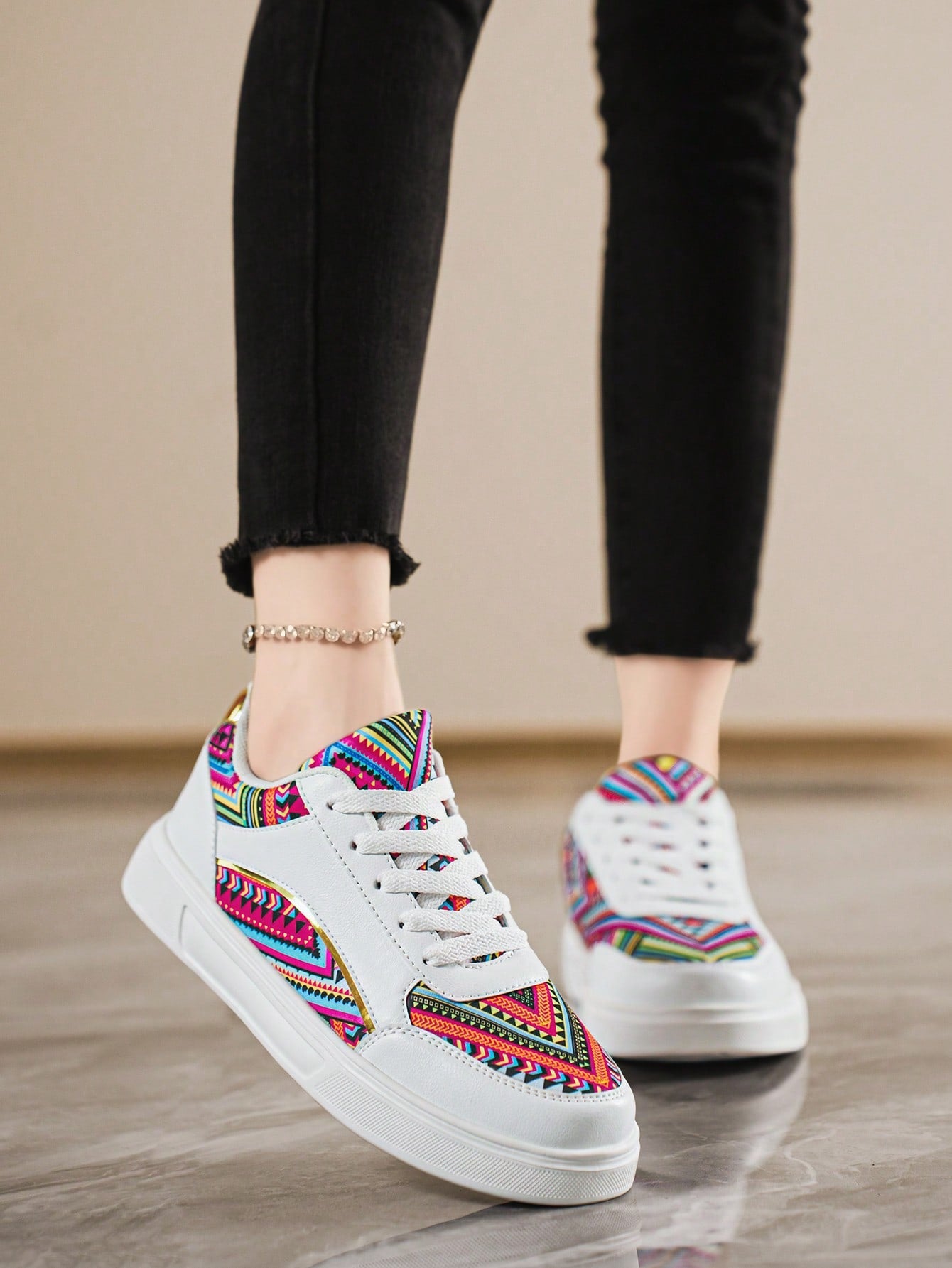 Step back in time with Retro Chic: Versatile Print & Color Block Platform Sneakers. These fashionable kicks offer effortless style with a fun twist. The platform design adds a playful touch while the versatile print and color block make it easy to pair with any outfit. Don't miss out on these retro gems!